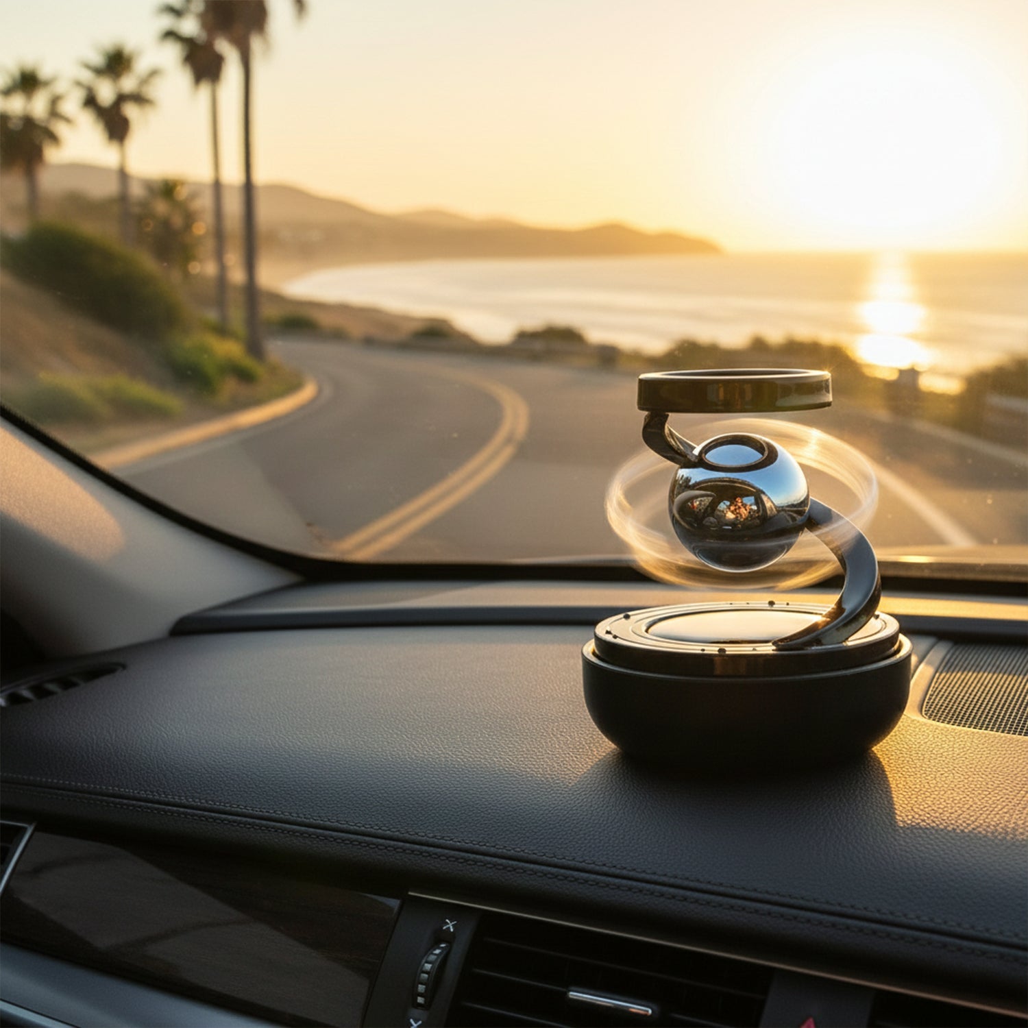 Close-up of solar-powered rotating car air freshener with fragrance compartment