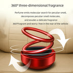 Decorative solar-powered swinging ring diffuser for car