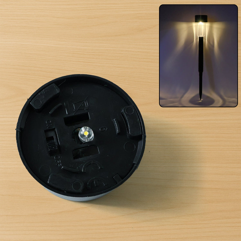 Landscape solar lights highlighting outdoor pathway at night