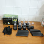 Complete solar powered garden lighting set installed outdoors