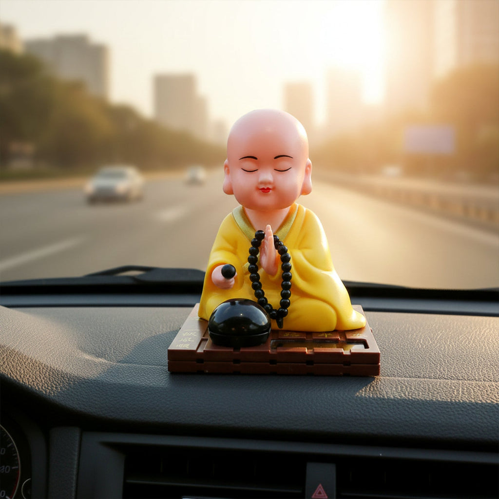 Solar powered Buddha figurine with gentle head and hand movements