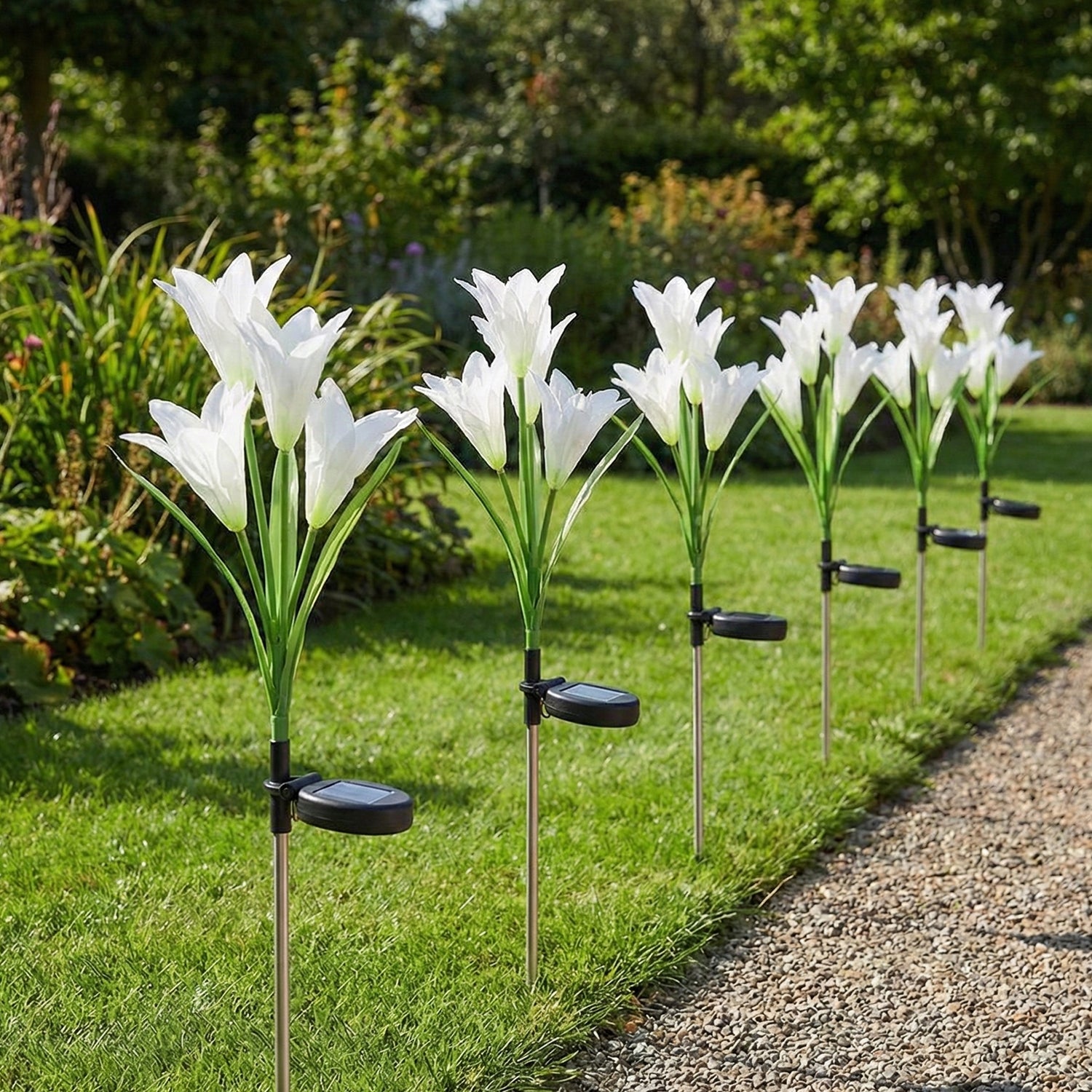 Decorative solar garden flower lights lighting up patio area at night