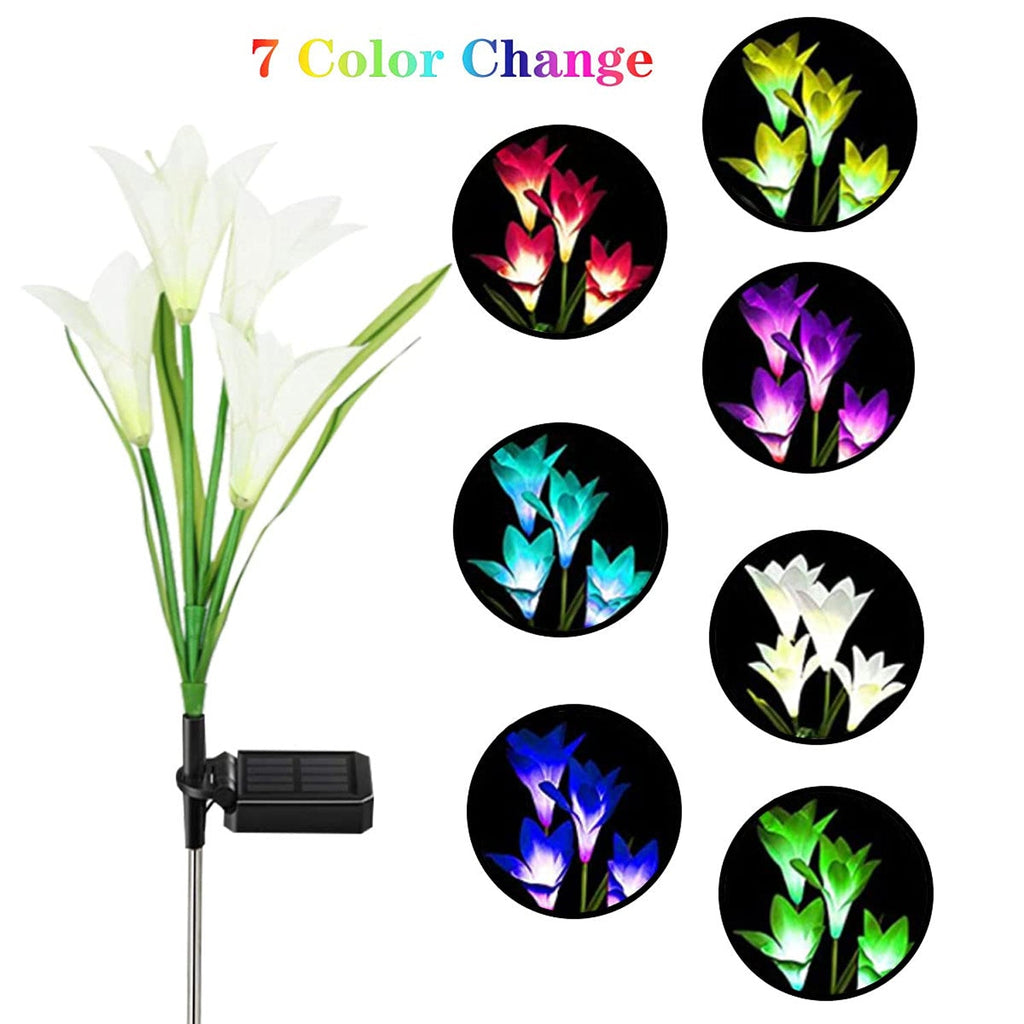 Outdoor solar garden flower lights installed in yard during nighttime