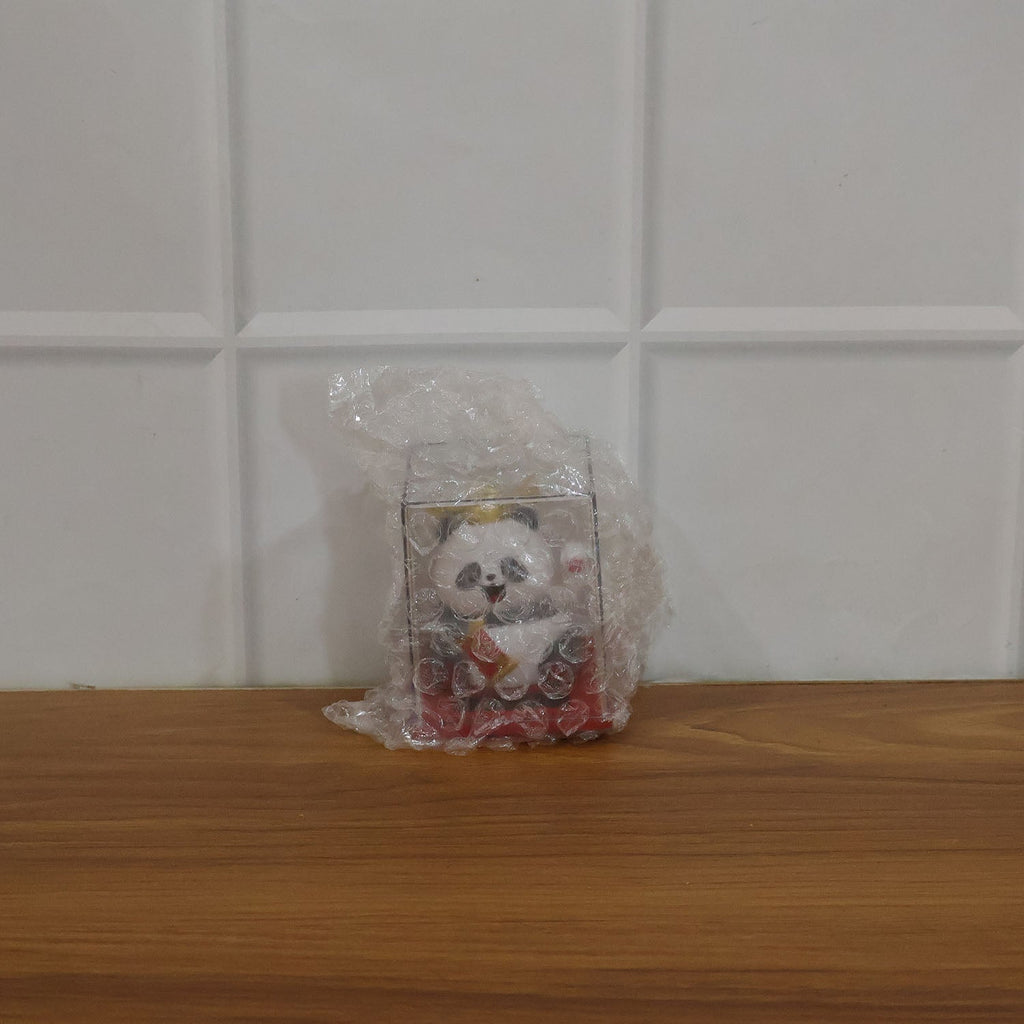 Funny moving panda collectible showing waving hand