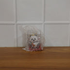 Funny moving panda collectible showing waving hand