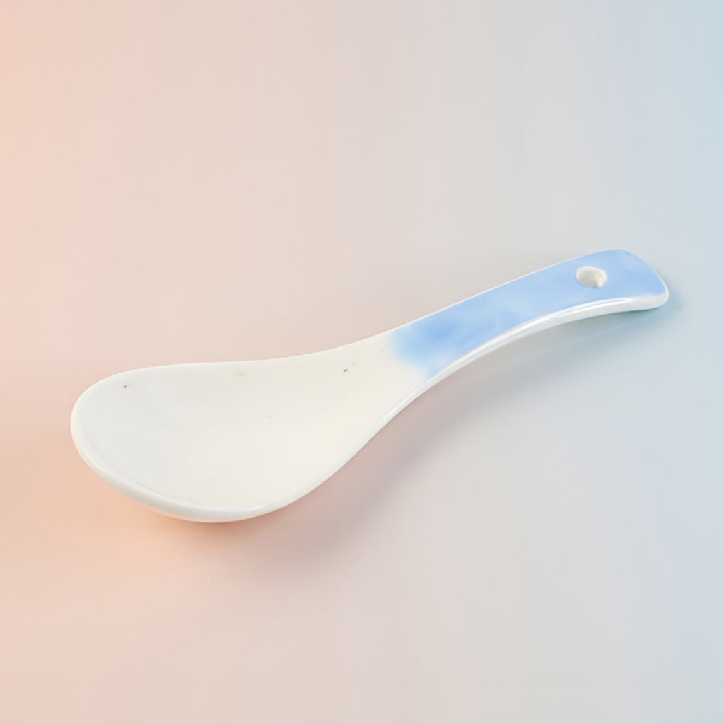 Ceramic serving spoon displayed for kitchen utensil collection