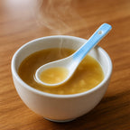 Smooth finish ceramic ladle with comfortable handle for serving