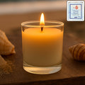 Refreshing Ocean Beach scented votive candle in a clear glass jar.