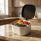 Top-down view of the compact 4-section spice container, ready for kitchen use.