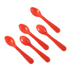 A hand using a white heat-resistant plastic spoon to serve a portion of food from a bowl.