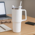 White insulated stainless steel travel tumbler with handle and lid