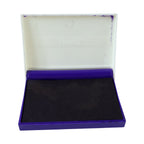 Durable ink stamp pad in casing, ensuring long-lasting performance.