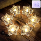 Set of 6 star-shaped flameless LED candles providing warm light