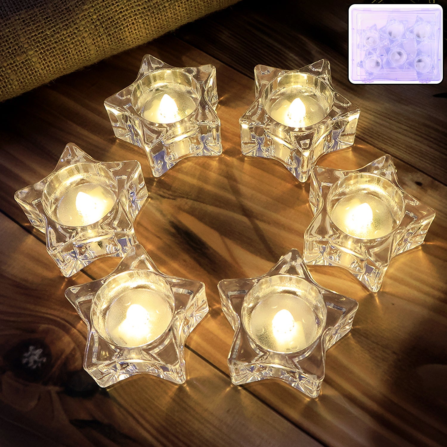 Set of 6 star-shaped flameless LED candles providing warm light
