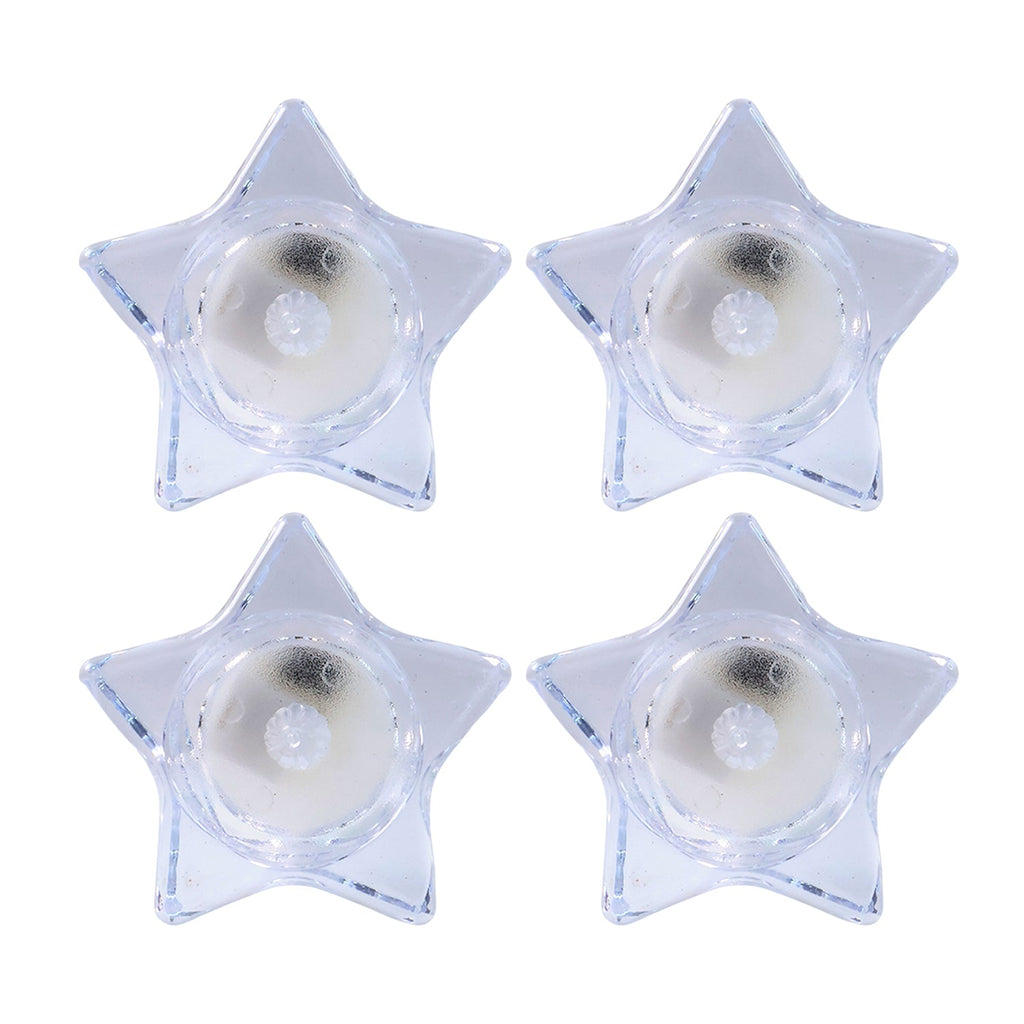 Flameless LED candles shaped like stars providing ambient light