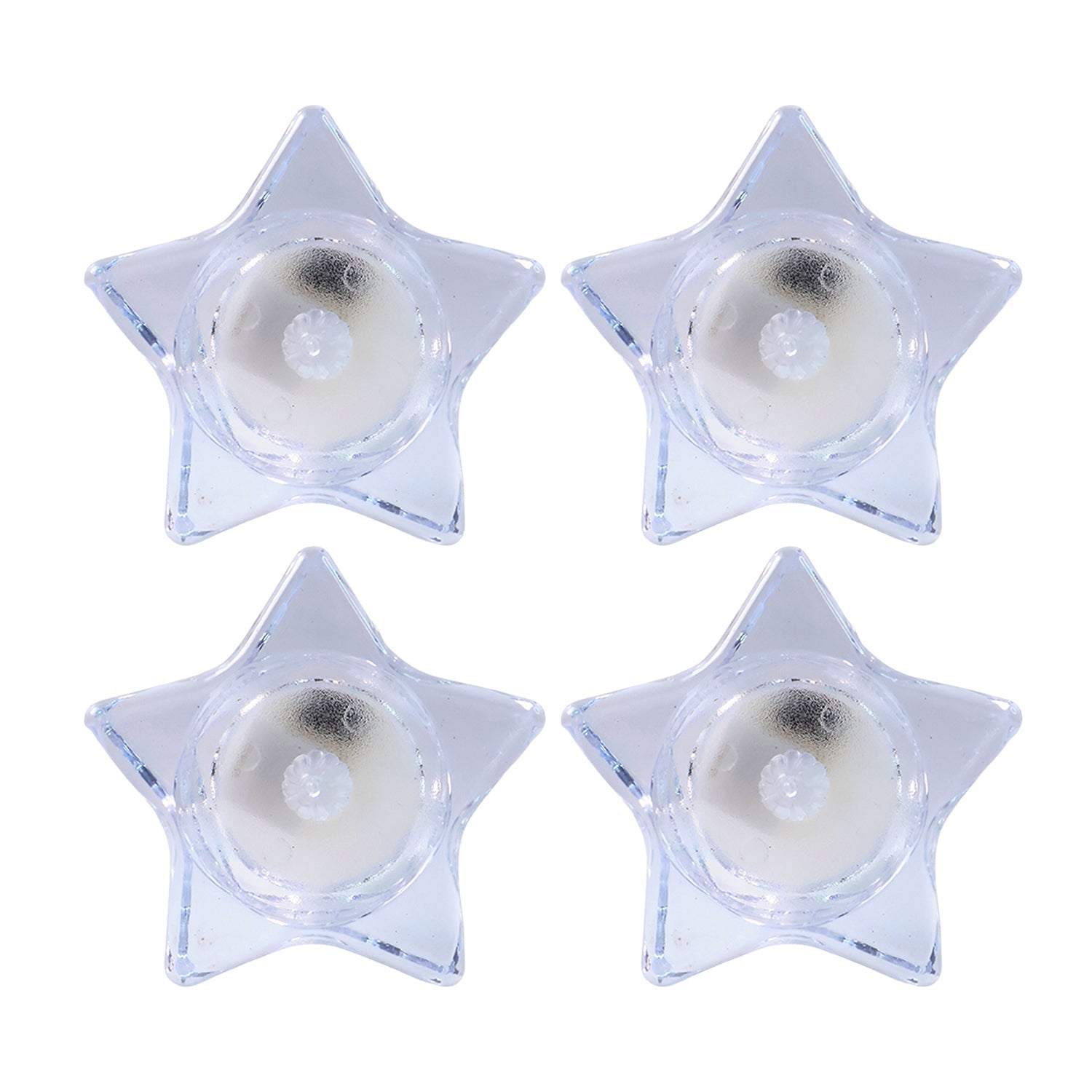 Flameless LED candles shaped like stars providing ambient light