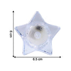 Warm flickering glow from star-shaped flameless LED candles