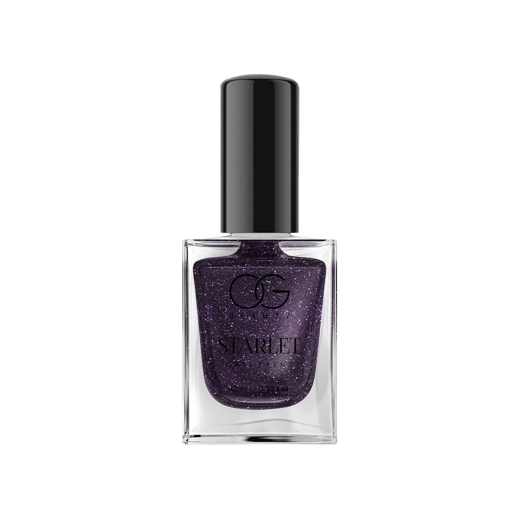 Vibrant purple glitter nails using Purple Dazzle nail paint