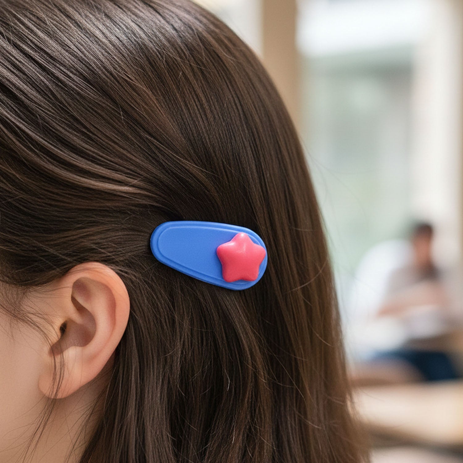 Backside clasp of colorful star hair clips showing secure grip