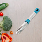 Apex stainless steel peeler displayed on kitchen countertop