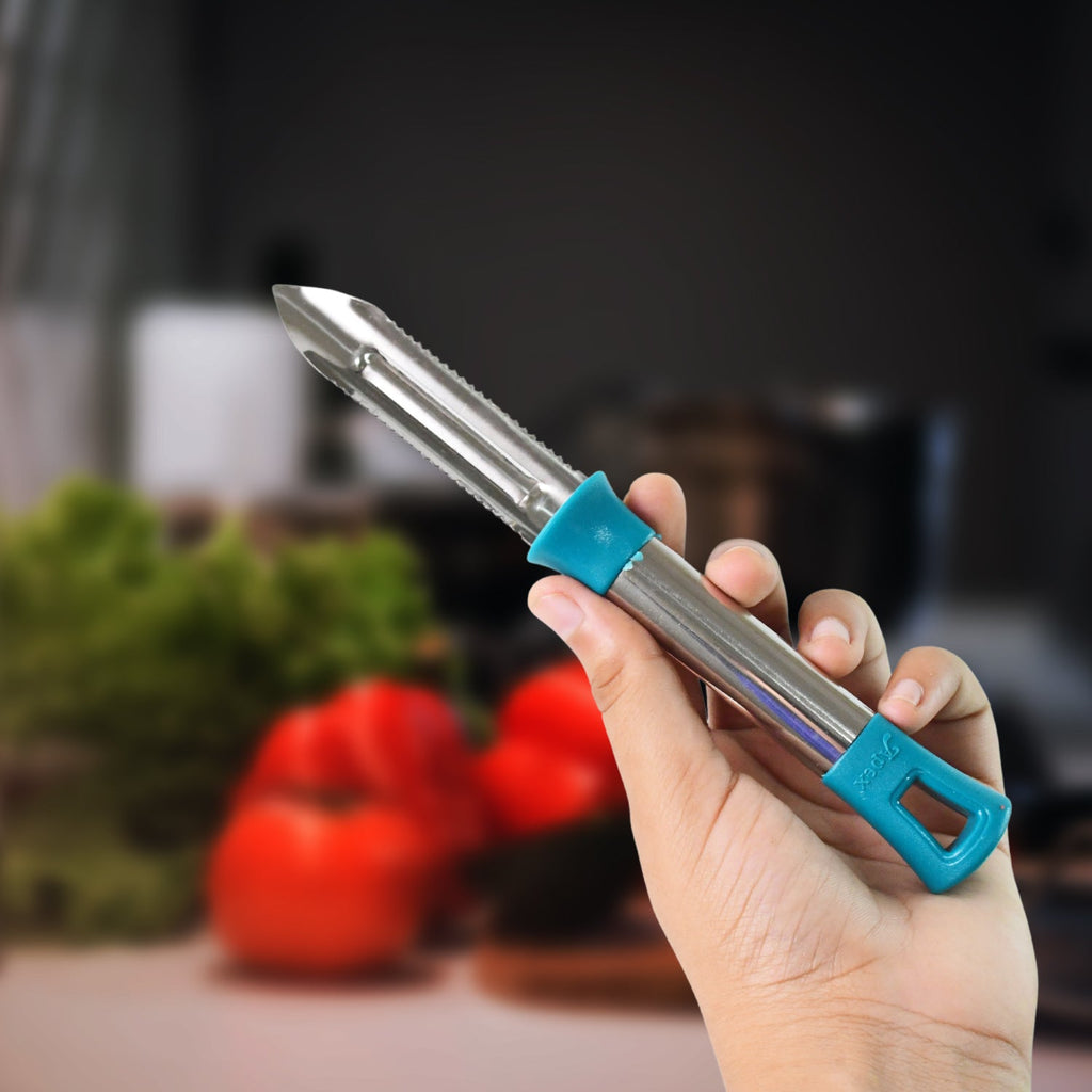 Close-up of steel peeler blade and ergonomic handle for peeling vegetables and fruits