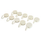 Adhesive round wall hooks organizing kitchen tools effectively