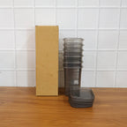 Collection of plastic storage containers with airtight lids