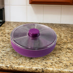 Side angle of purple rotating dry fruit and snack storage container