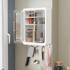 Empty sliding door wall-mounted kitchen cabinet attached to wall
