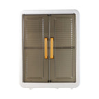 Sliding door kitchen storage cabinet with organized spices and tools