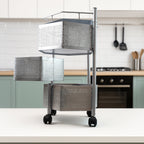 Multipurpose metal kitchen storage trolley showing detailed basket design