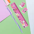 Fun pink stationery set including ruler, pencil, eraser, and sharpener