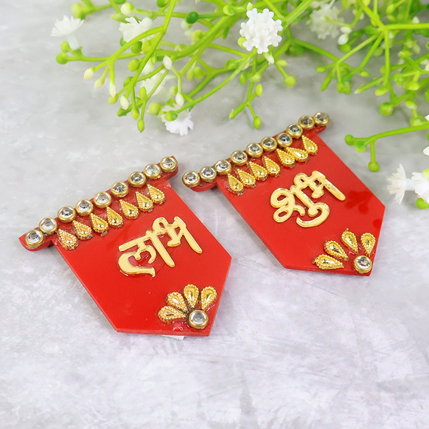 Golden and red Shubh Labh wall hangings adding prosperity symbol to home