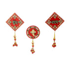 Close-up of intricate Shubh Labh and Ganesh bead-decorated wall hanging