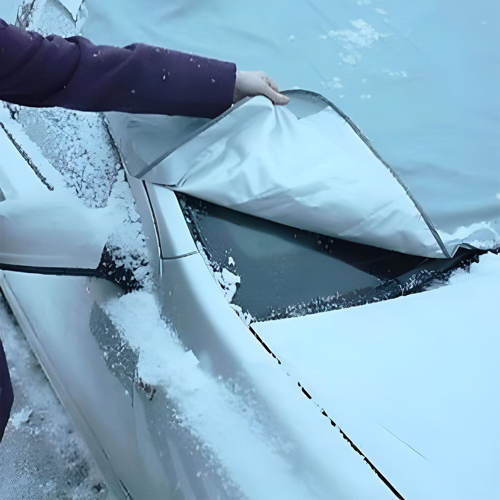 Folded car windshield snow and sun cover ready for storage in glove box