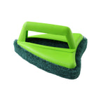 Person using the Pro Clean scrubber brush to effectively clean bathroom tiles.