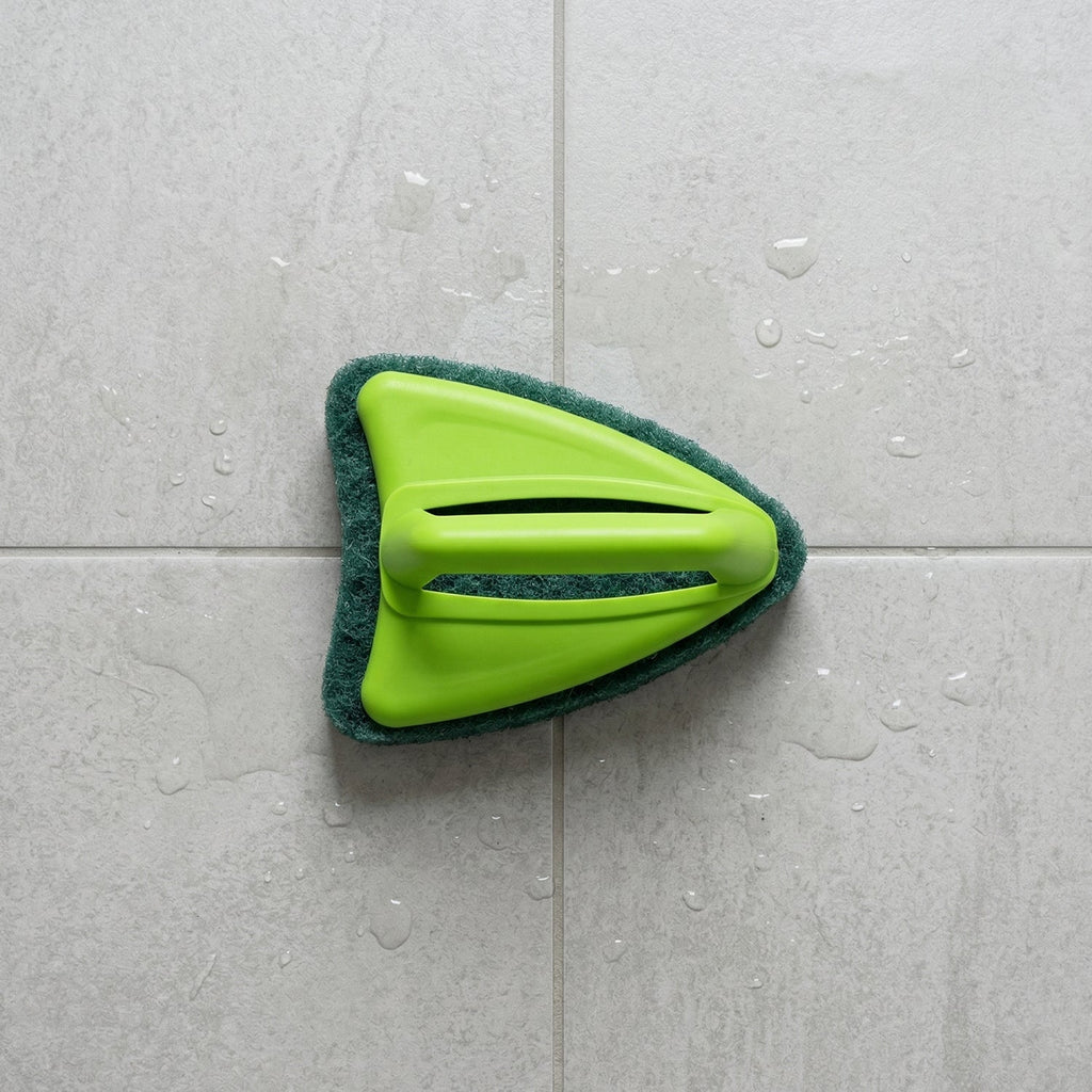 Ergonomic plastic handle of the bathroom cleaning brush for comfortable, dry grip.
