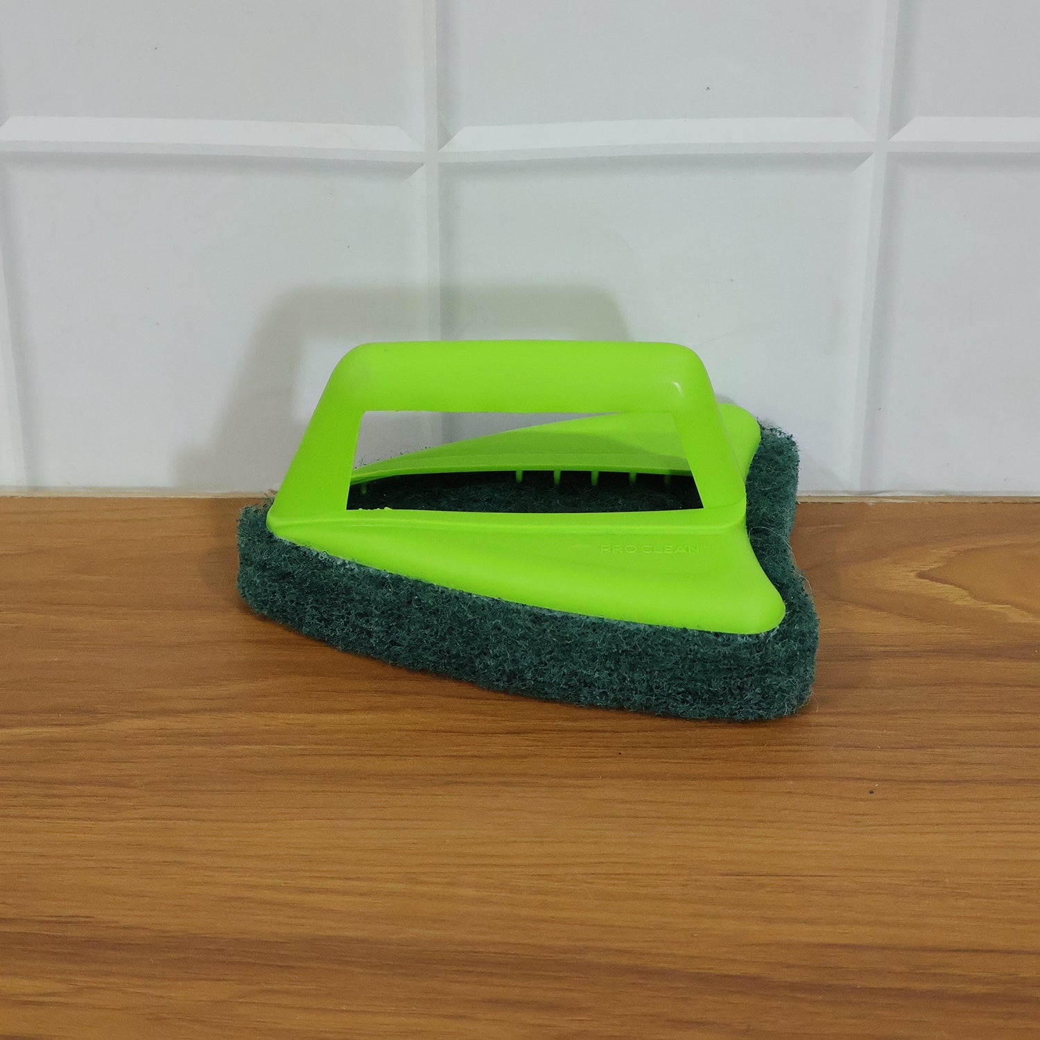 Live demonstration of the Pro Clean tile cleaning brush in action on floor tiles.