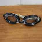 Clear swimming goggles featuring UV protection lenses for eye safety