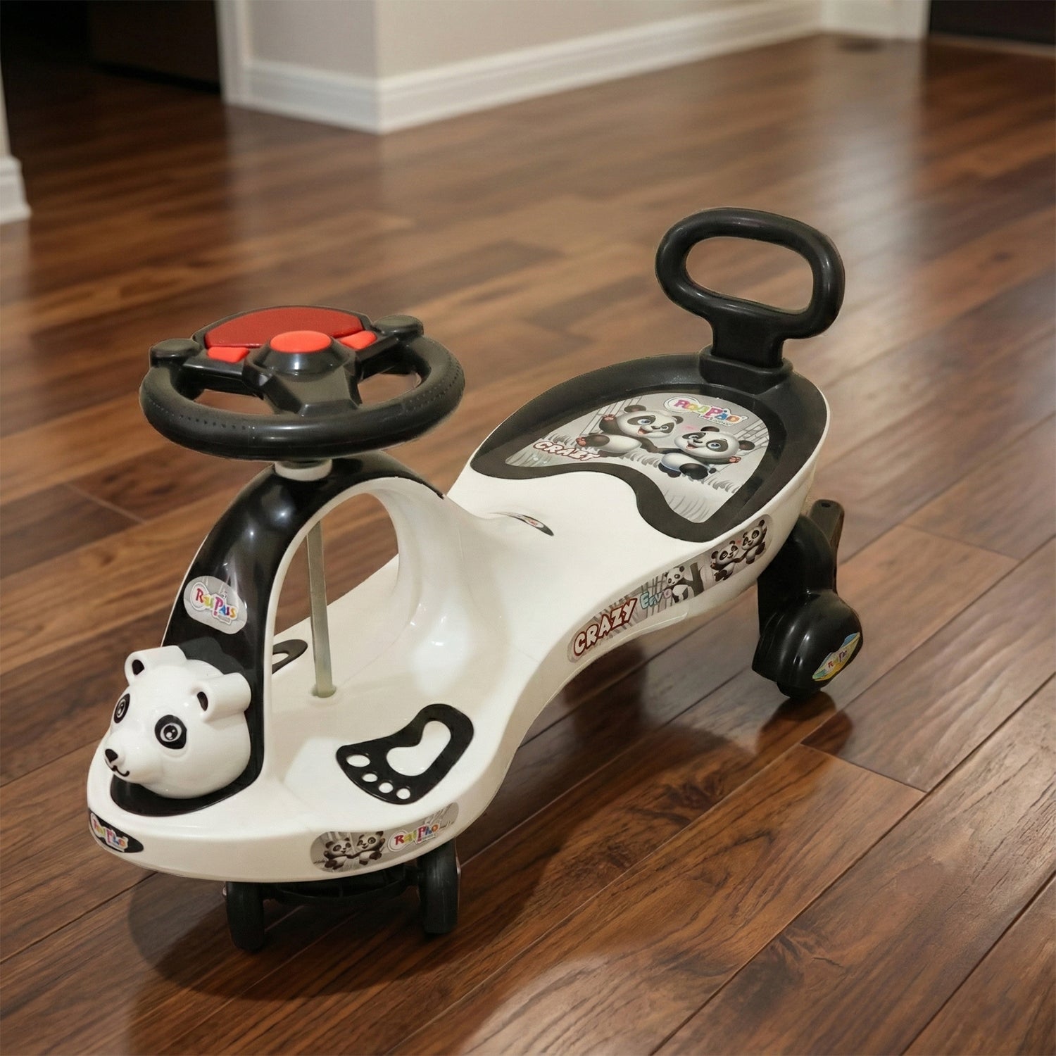 Detail of steering handle of baby magic swing car ride-on toy