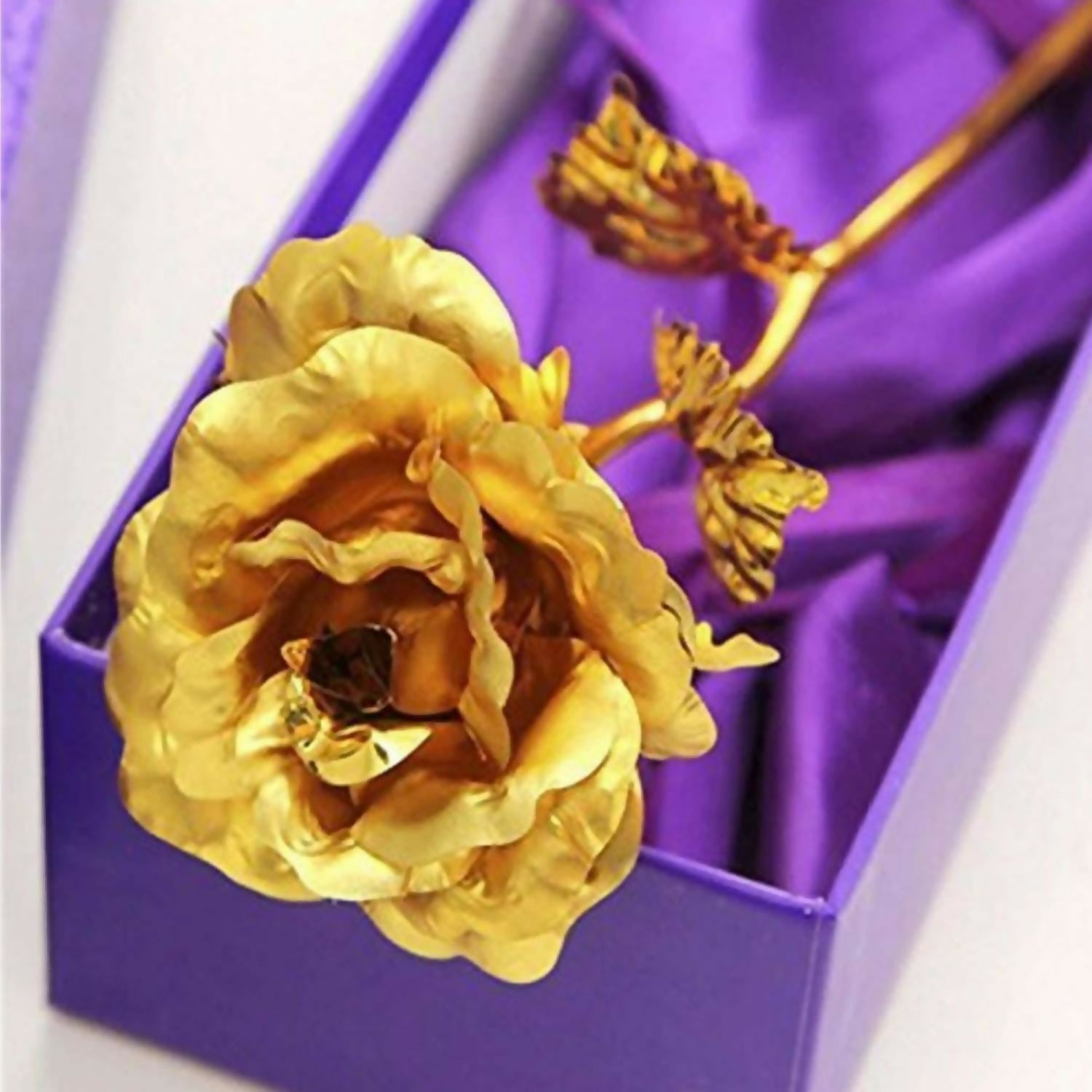Close-up image of luxury gold plated artificial rose