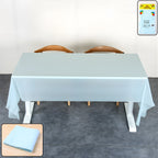 Waterproof disposable plastic table cover protecting rectangular table surface