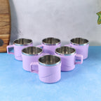 Close-up of sturdy tea and coffee cups featuring a ribbed, anti-slip outer sleeve.