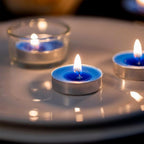 Assorted scented tea light candles arranged for festive and home décor