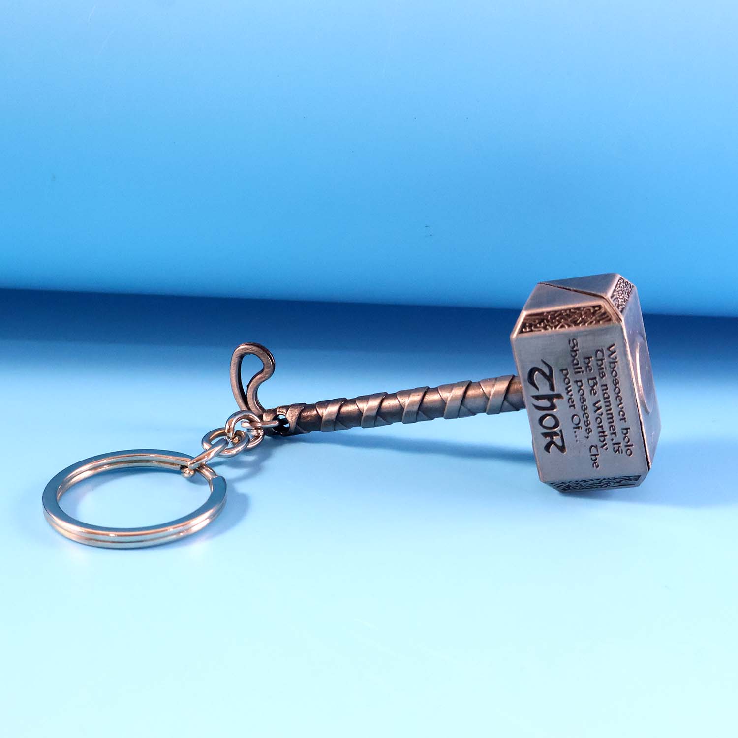 Metal hammer keychain with sturdy metal ring holding keys