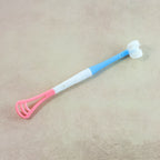 Baby tongue cleaner showing soft brush and scraper ends for oral care