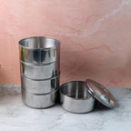 Empty round stainless steel lunch box, highlighting its clean design.