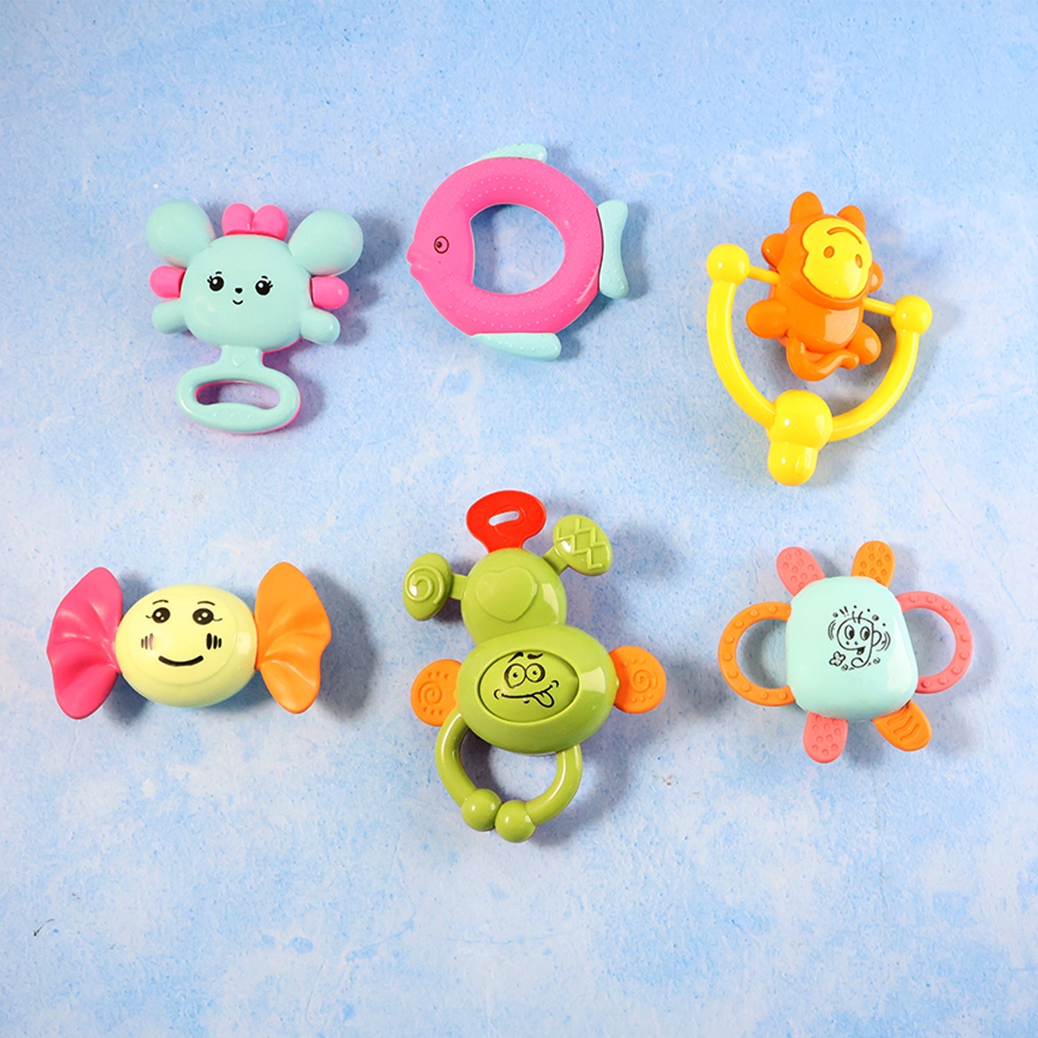 Assorted baby rattles with different textures to stimulate touch senses