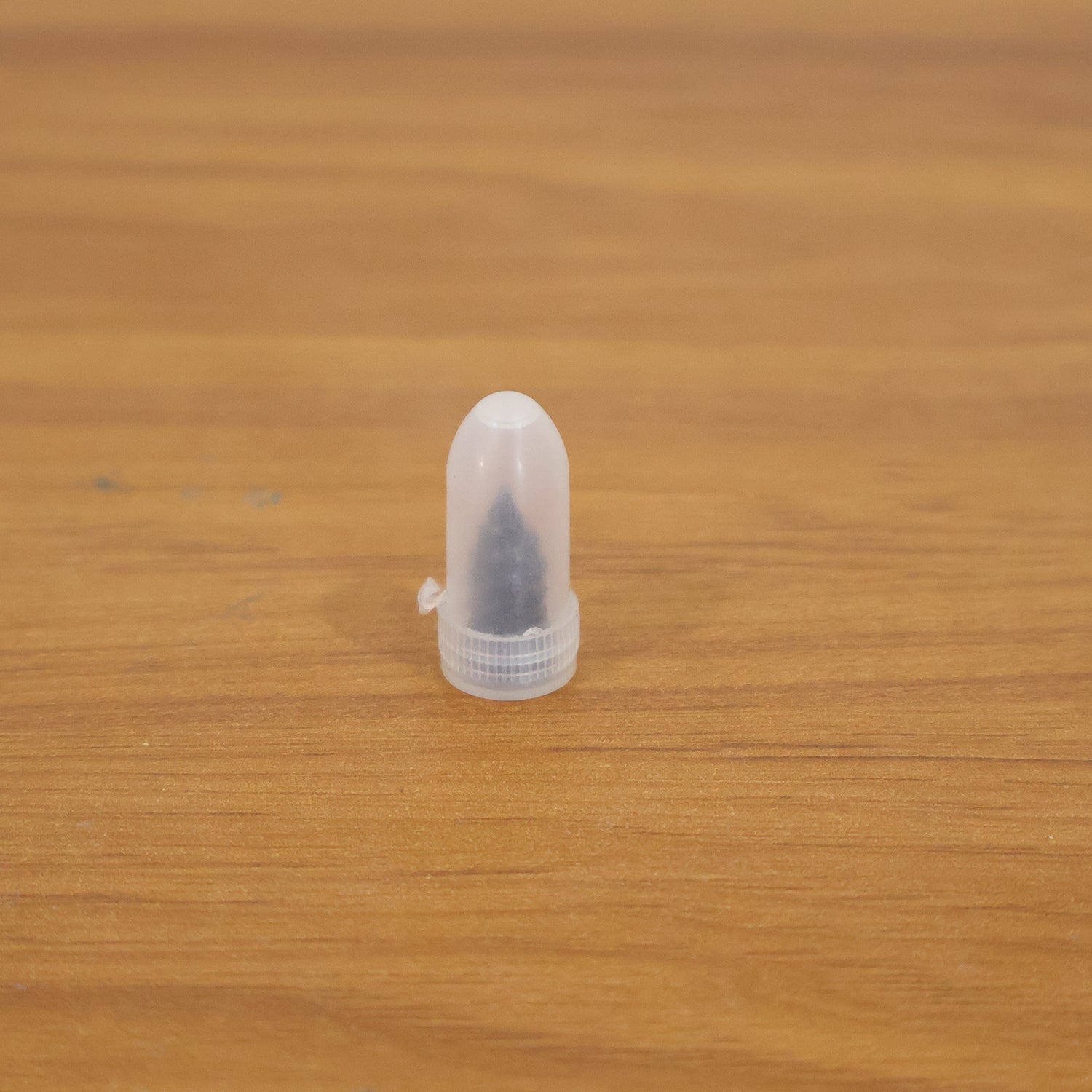 Tire puncture repair rubber plug in use