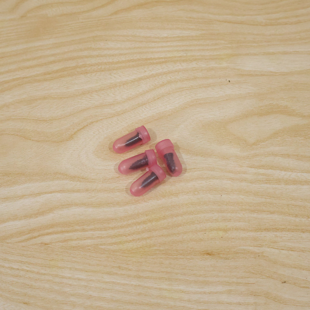Pink tubeless tire repair nail in use